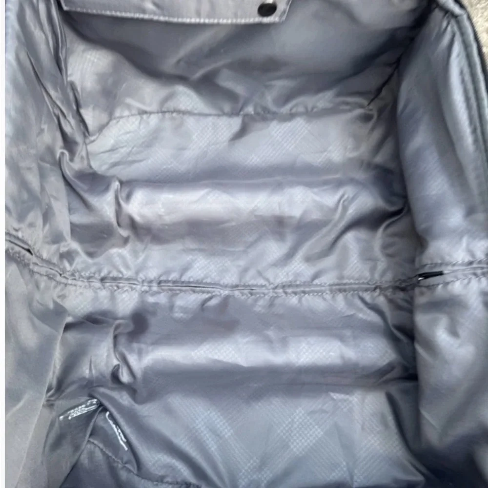Travelpro Black Soft-Shell Rolling Under-seat Carry-On with Front Pocket